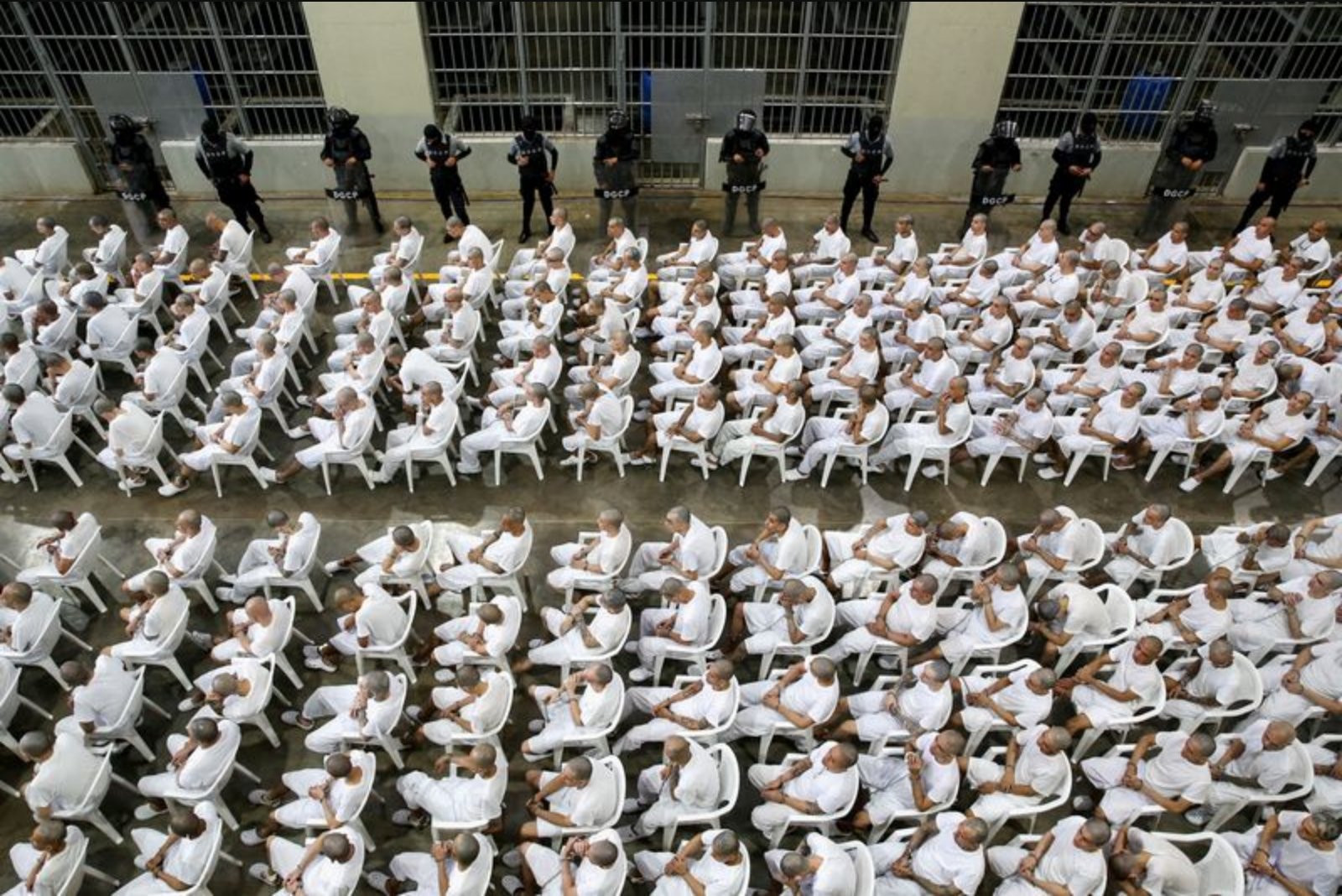 Inside El Salvador’s Mega-Prison: Hundreds Shackled as Mass Trial Is Broadcast to Inmates