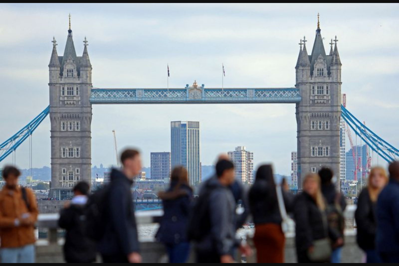 UK Regular Pay Growth Eases Slightly Less Than Forecast in Three Months to February