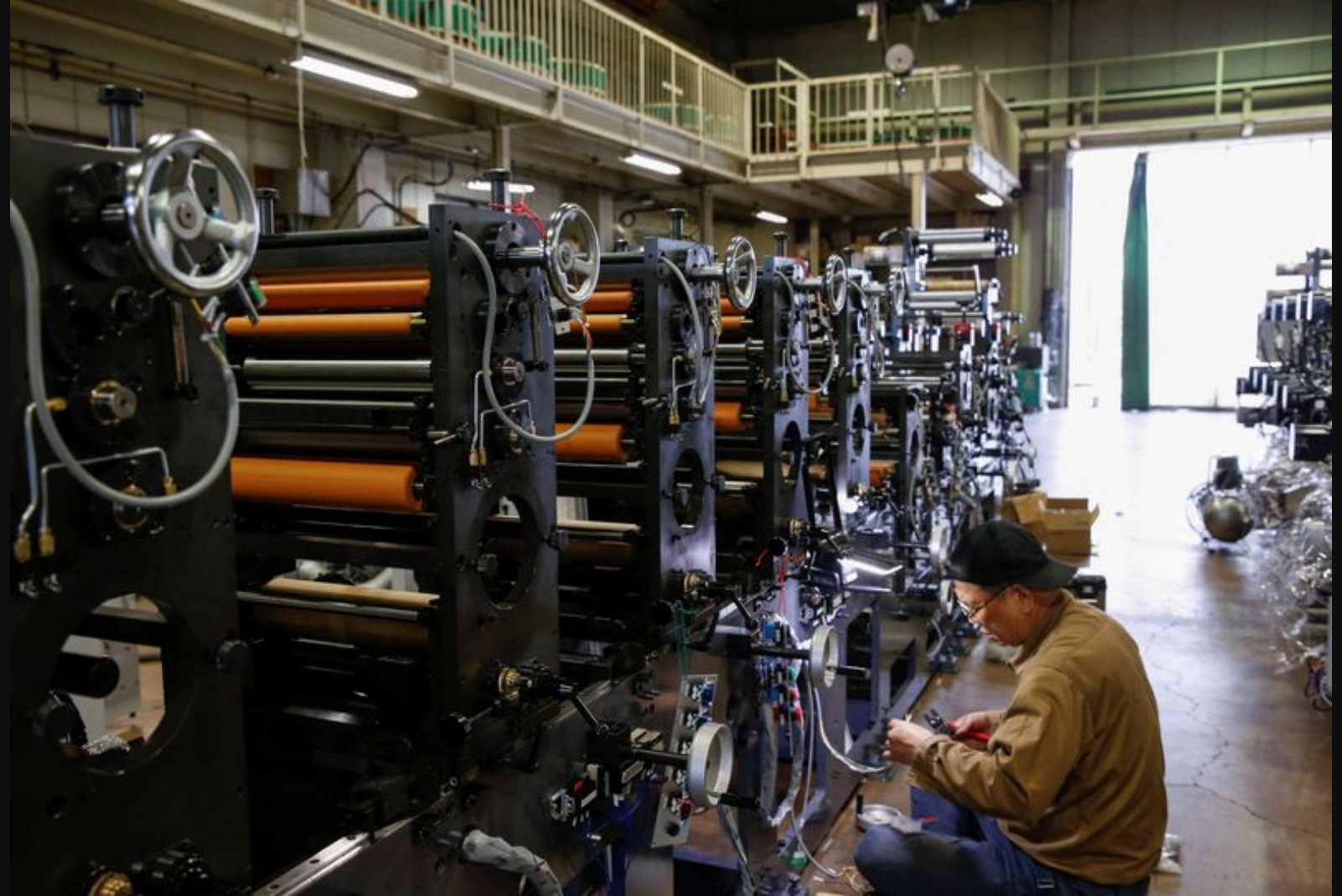 Japan manufacturers' confidence rises to four-year high as chemicals and semiconductors lead recovery