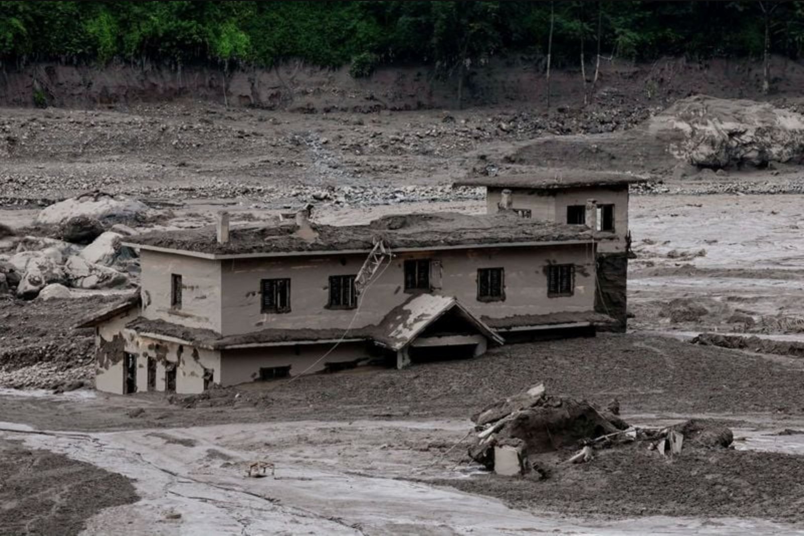 Flash flood at Nepal-Tibet border kills nine, hundreds of tourists unaccounted for