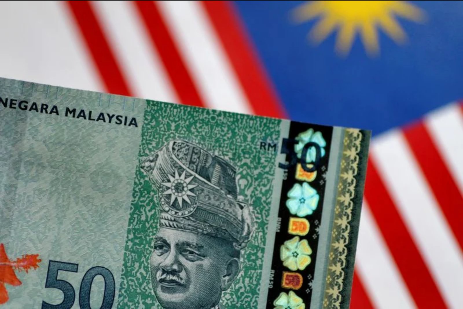 Malaysia Bolsters Ringgit Defense Amid Dollar Strength