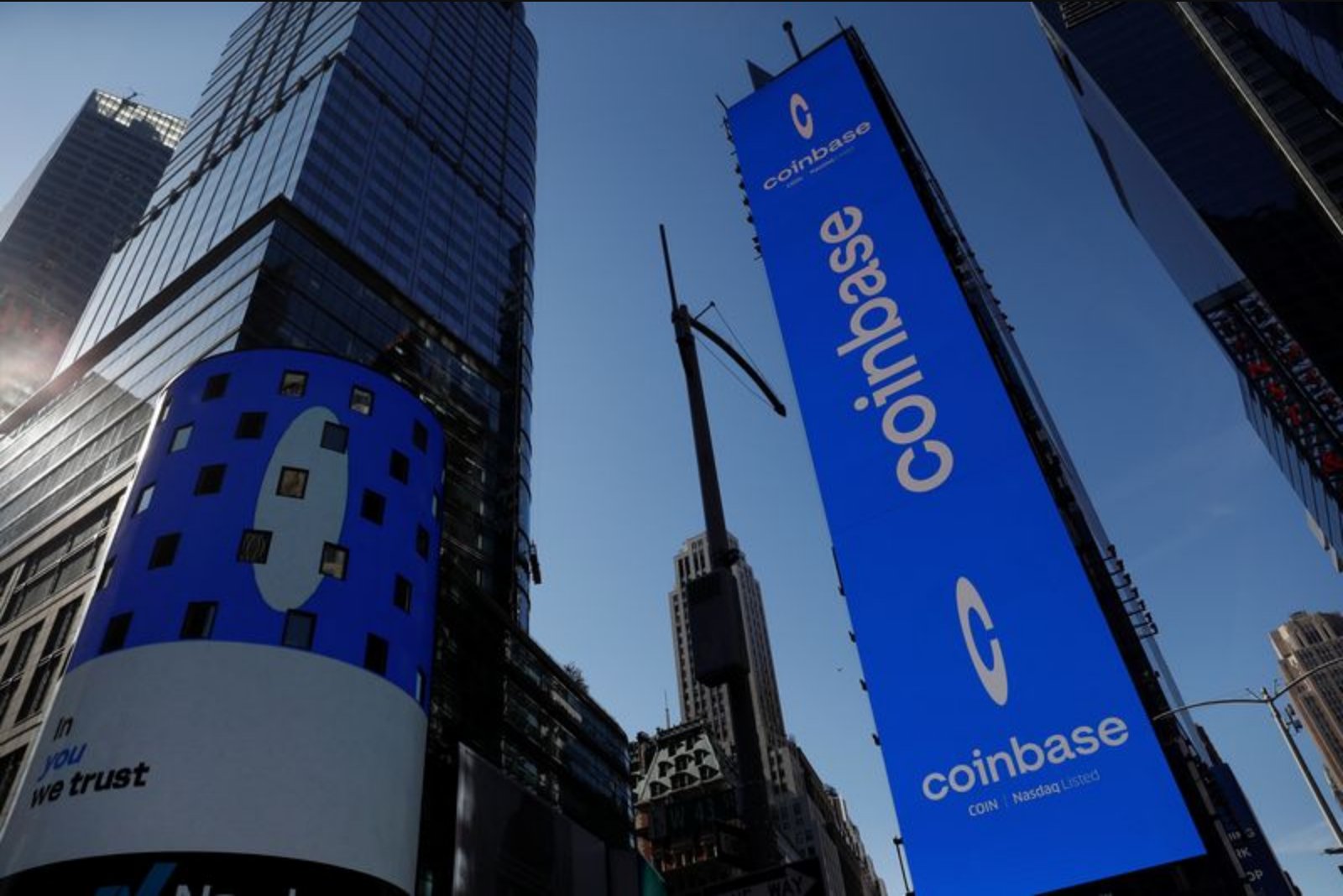 Coinbase to Cut About 14% of Staff as It Reduces Costs and Reorganizes Around AI
