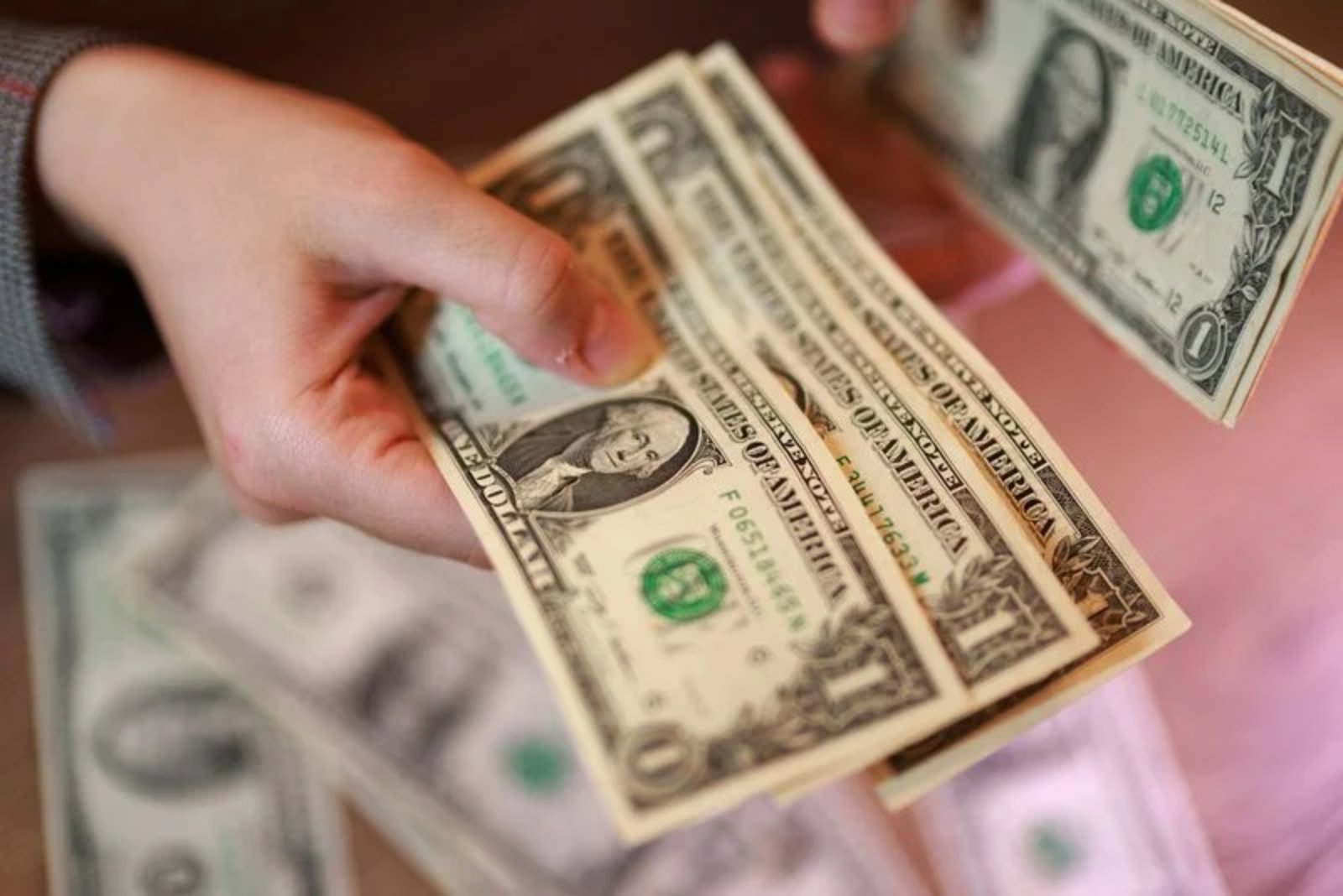 Dollar expected to hold steady near term then ease later as Middle East war and inflation pressures test policy